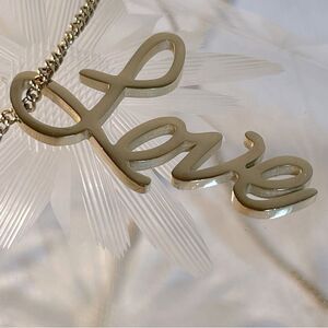 Love necklace long gold love benevolence Los Angeles